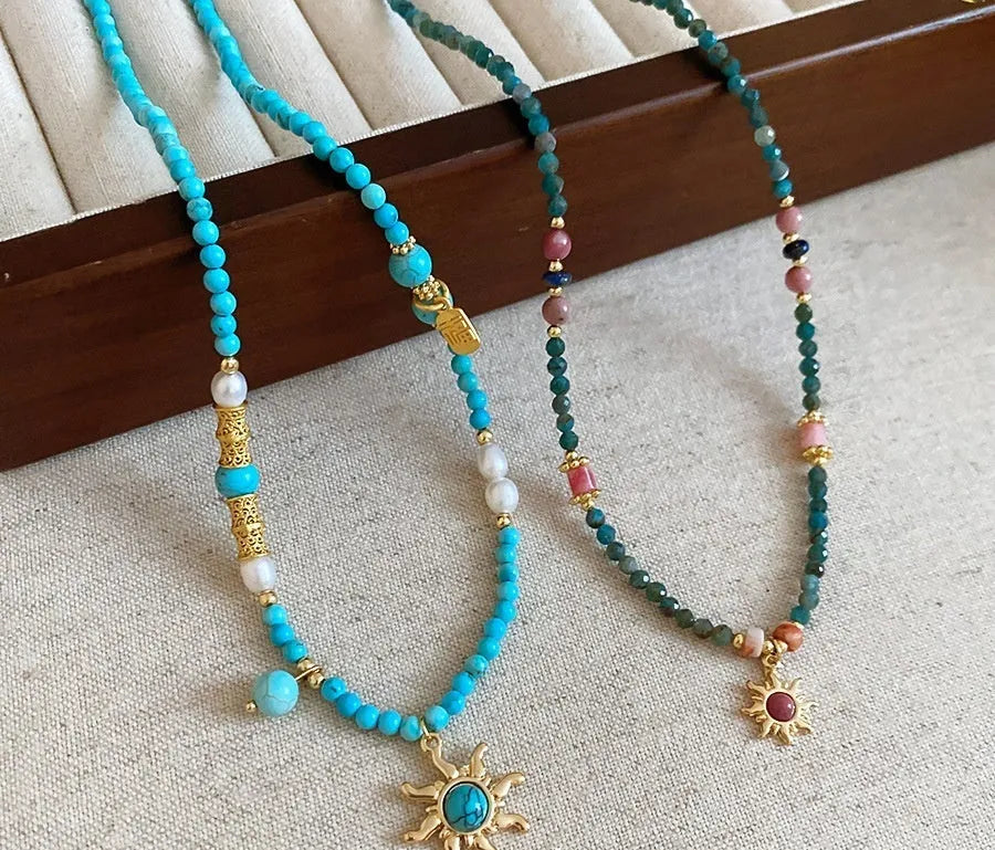 Freshwater pearl necklace with stone sun pendant in French royal court style, blue sun colour option