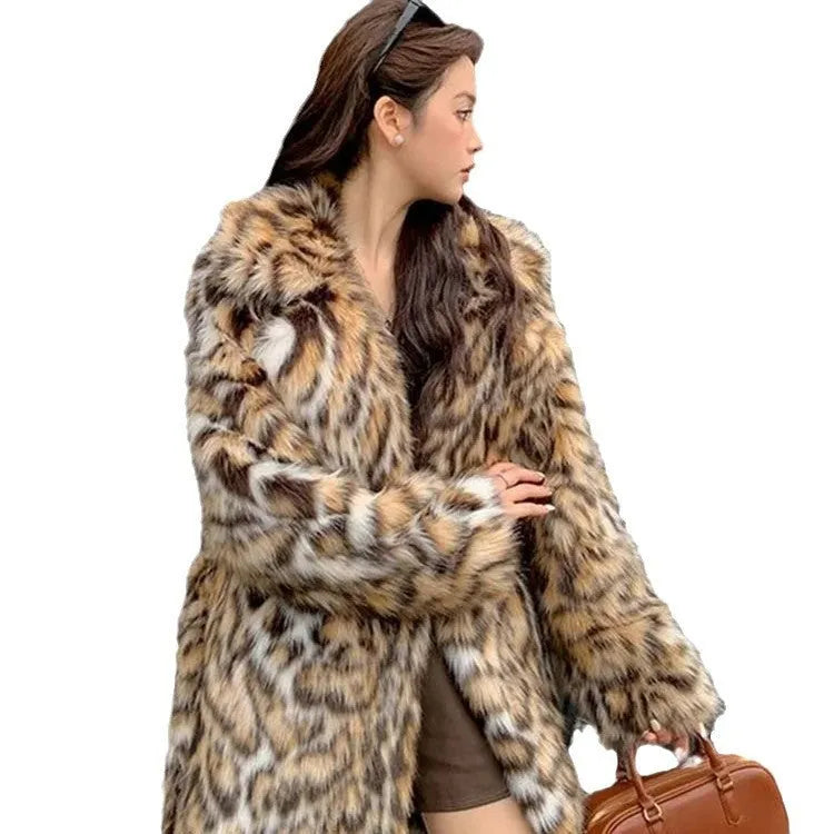 Women's faux fur coat with a large fur collar in a street fashion style.