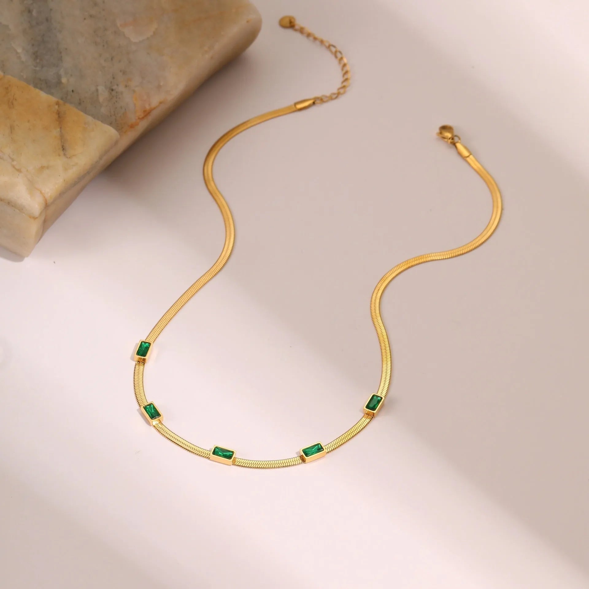 Geometric square zircon necklace on stainless steel flat snake chain in gold or steel finish