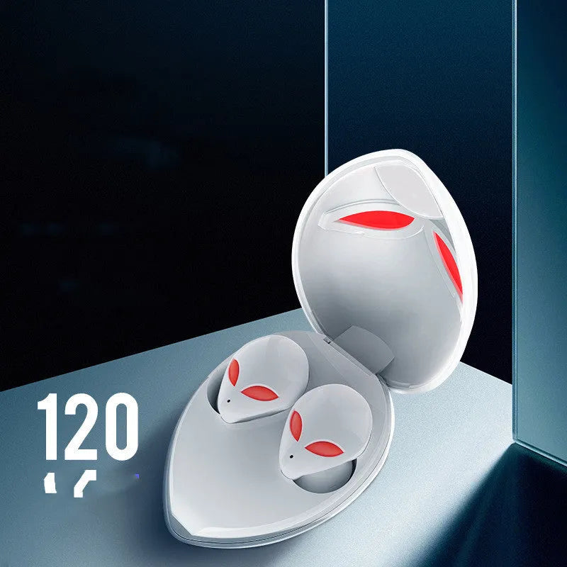 Creative Outer T8 Starman alien-design Bluetooth earbuds with red LED lights and wireless charging case.