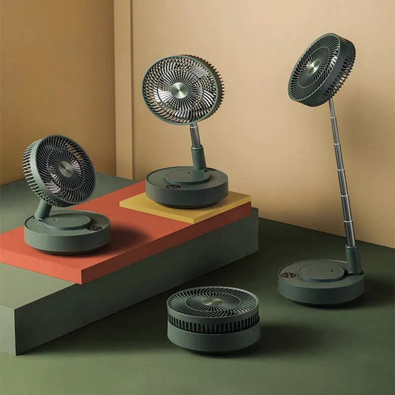 Green telescopic rechargeable electric fan showing extended floor-standing position with remote control