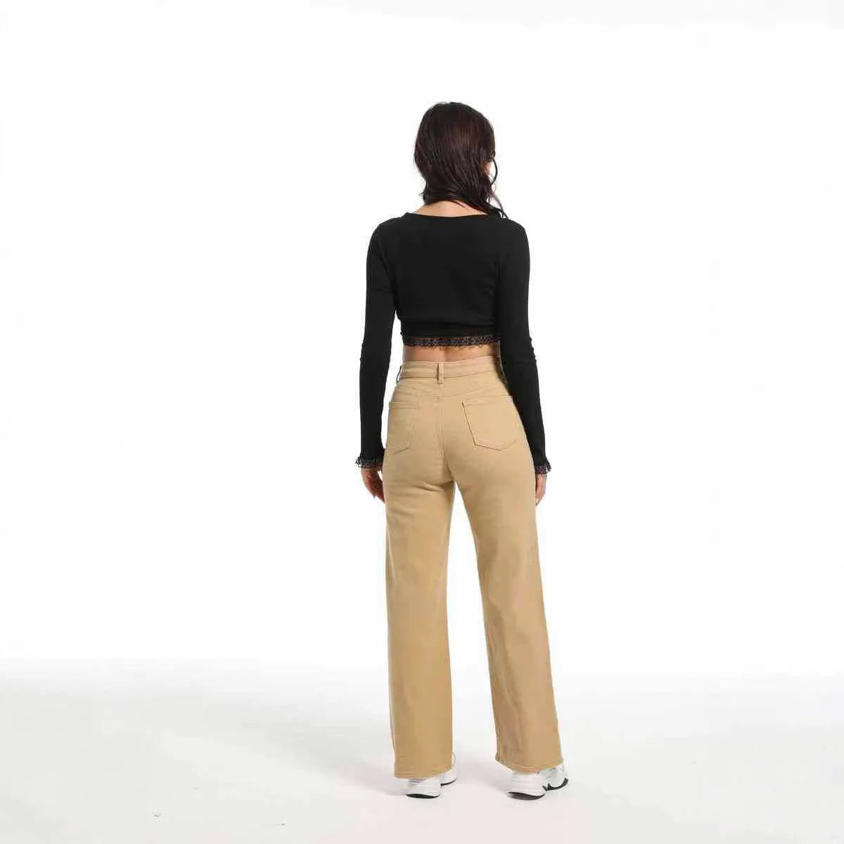 Women's high-waisted wide-leg straight jeans in apricot colour on a hanger
