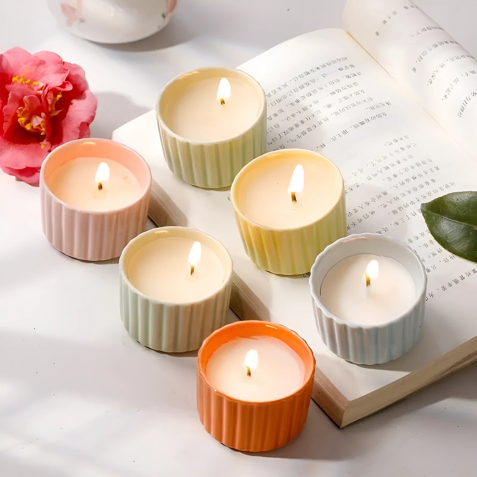 Soy aromatherapy candle in a white ceramic cup with floral scents for bedroom use
