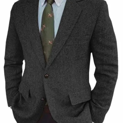Man wearing a brown herringbone pattern retro suit jacket with a long sleeve cut.