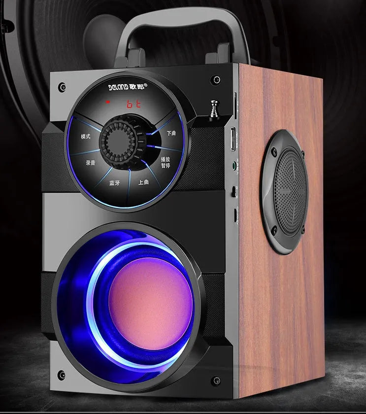 Black portable mini audio system with subwoofer, connection cable, and charging accessories