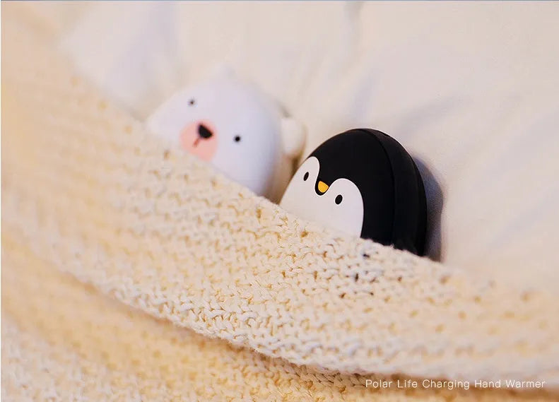 Cartoon penguin polar bear design USB rechargeable electric hand warmer showing front view