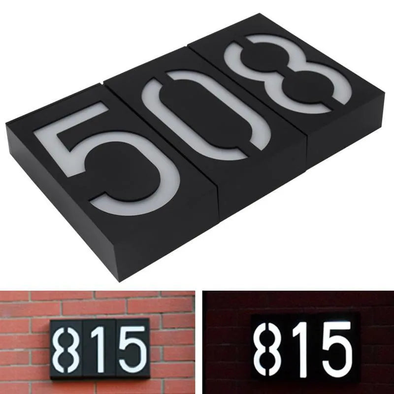 Solar powered house number light with LED illumination showing digit example on wall mounting