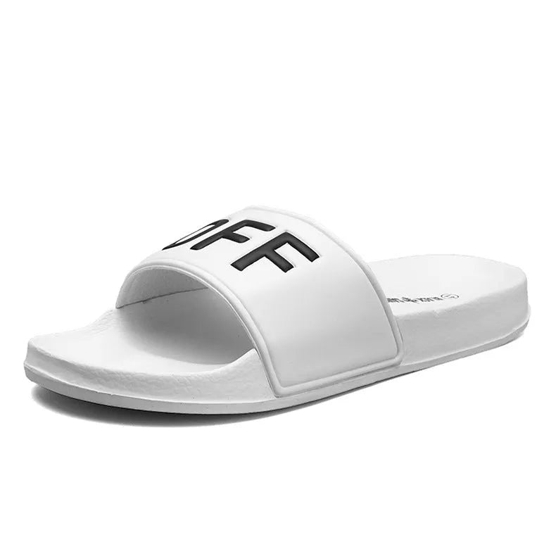 Men's black open-toe slippers with a rubber sole and viscose upper, shown next to a white pair.