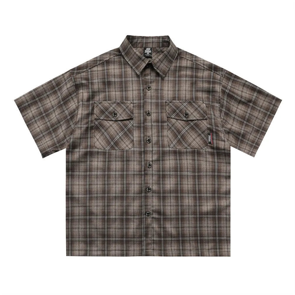 Men's black plaid shirt with embroidered letter detailing and short sleeves
