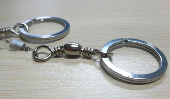 Stainless steel survival wire saw with thumb rings for outdoor cutting