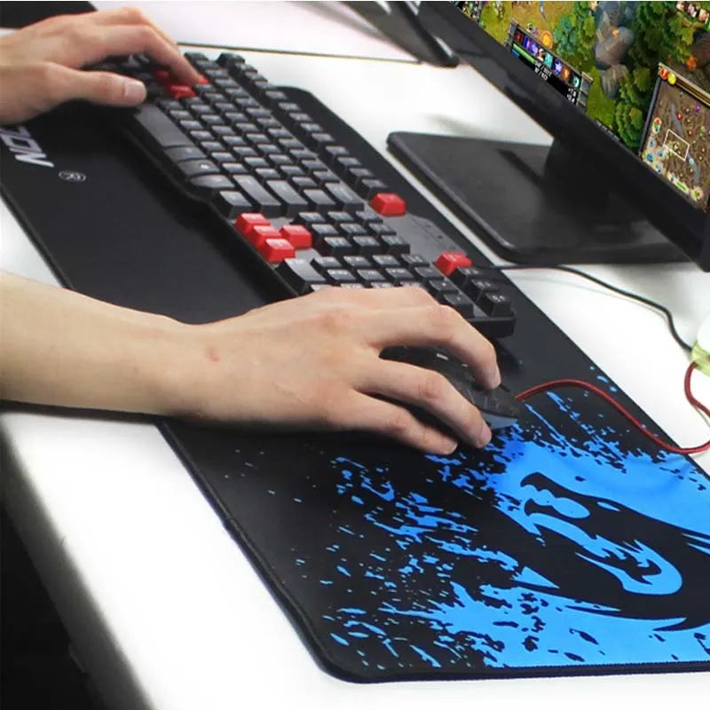 Mouse pad with textured surface and non-slip rubber base on a desk