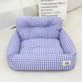 Car-mounted pet travel nest in stain-resistant cloth fabric showing grey and blue plaid colour options