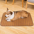 Brown woven rattan dog cooling mat for summer, shown in a large size.
