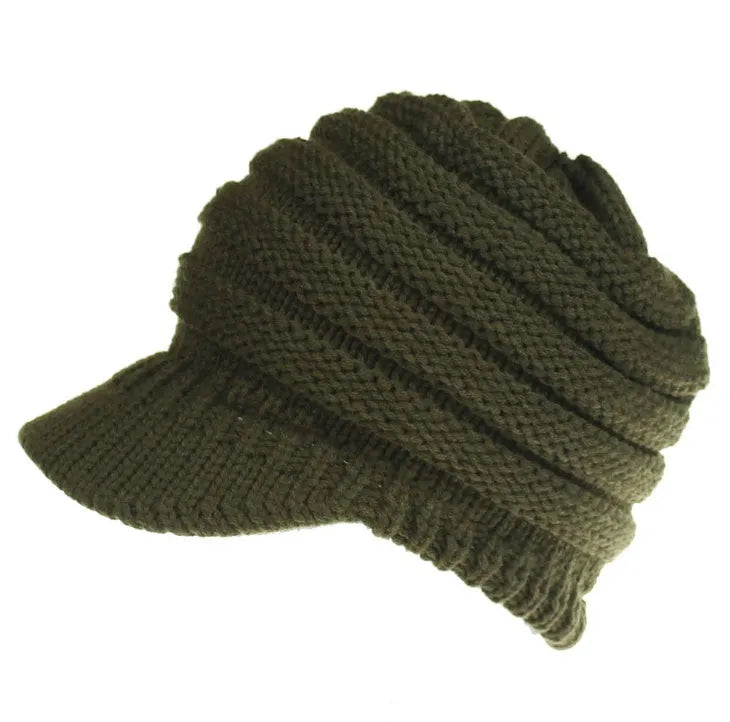 Women's acrylic ponytail beanie with back opening showing hairstyle accommodation