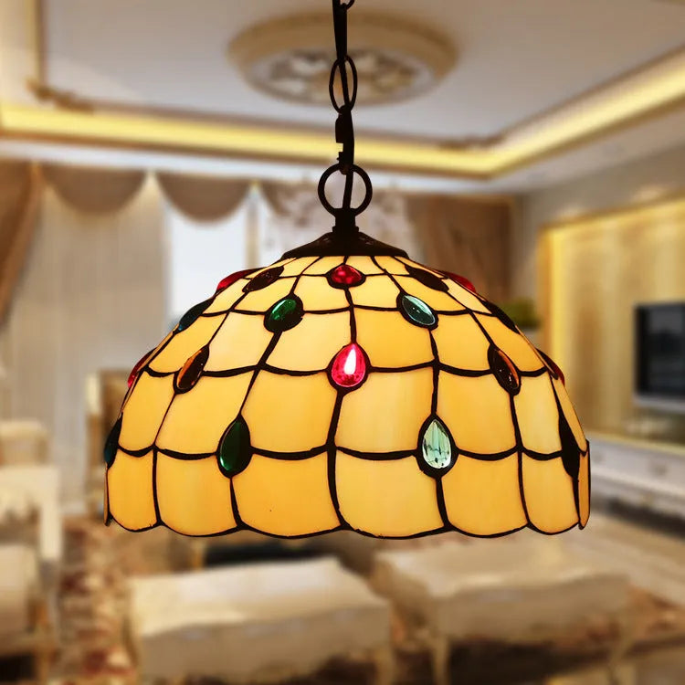 European baroque style chandelier with a coloured glaze finish and abstract design.