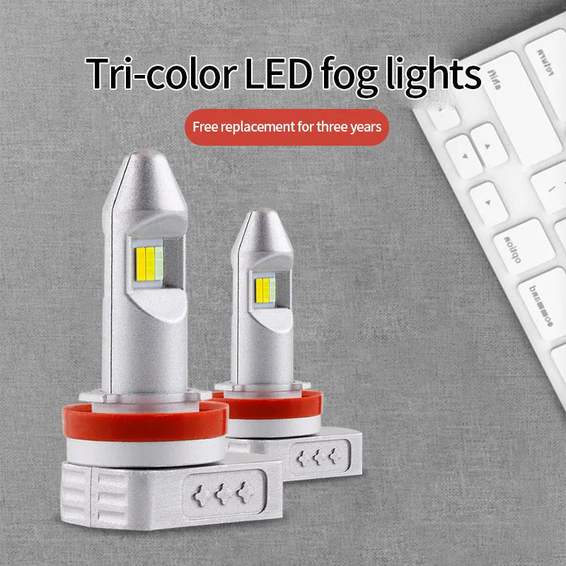 Single LED fog lamp bulb with aluminium housing and multiple connector adapters on a white background.