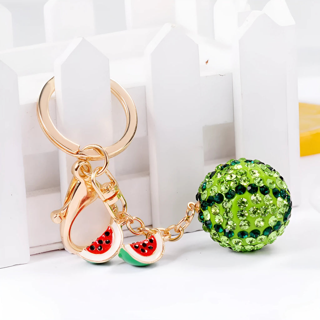 Green watermelon-shaped zinc alloy keychain measuring 12 centimetres