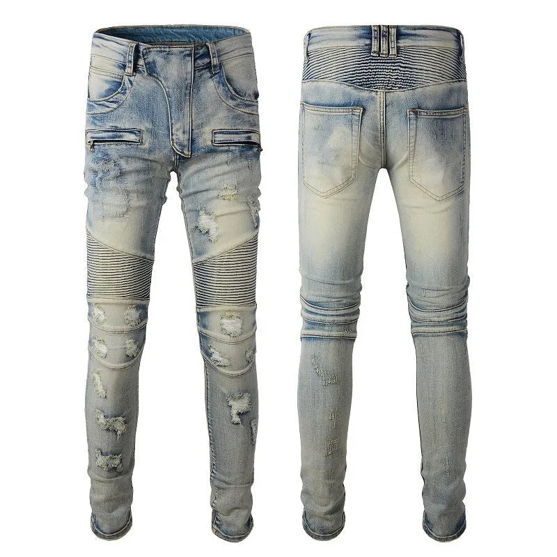 Men's light blue distressed slim fit jeans with hand-frayed details and straight leg opening