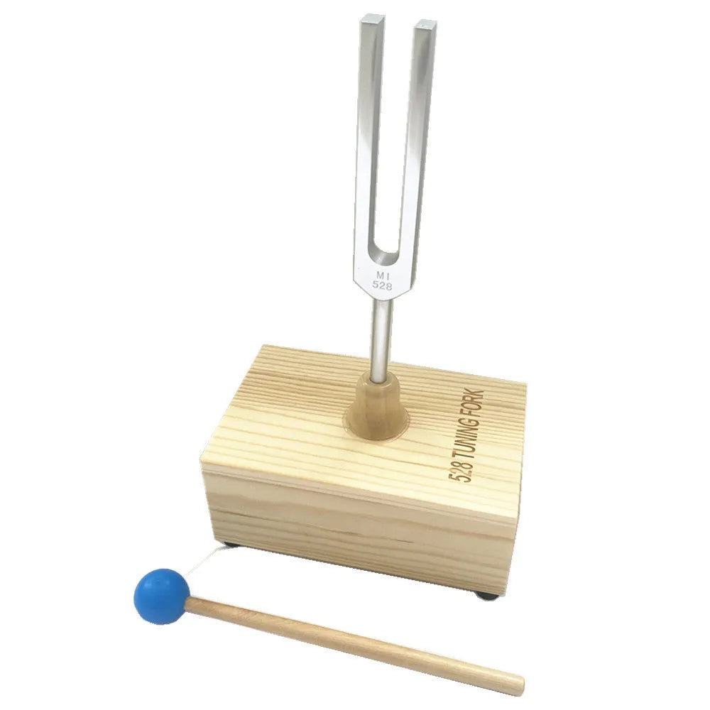 Aluminium alloy 432Hz tuning fork and speaker set on kraft paper box