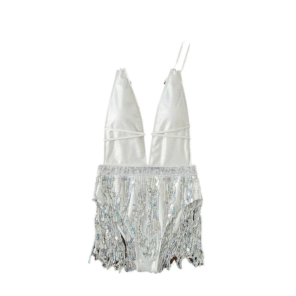 White one-piece swimsuit with a deep V-neckline and a decorative tassel.