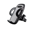 Black plastic mobile phone holder mounted on car air conditioning vent