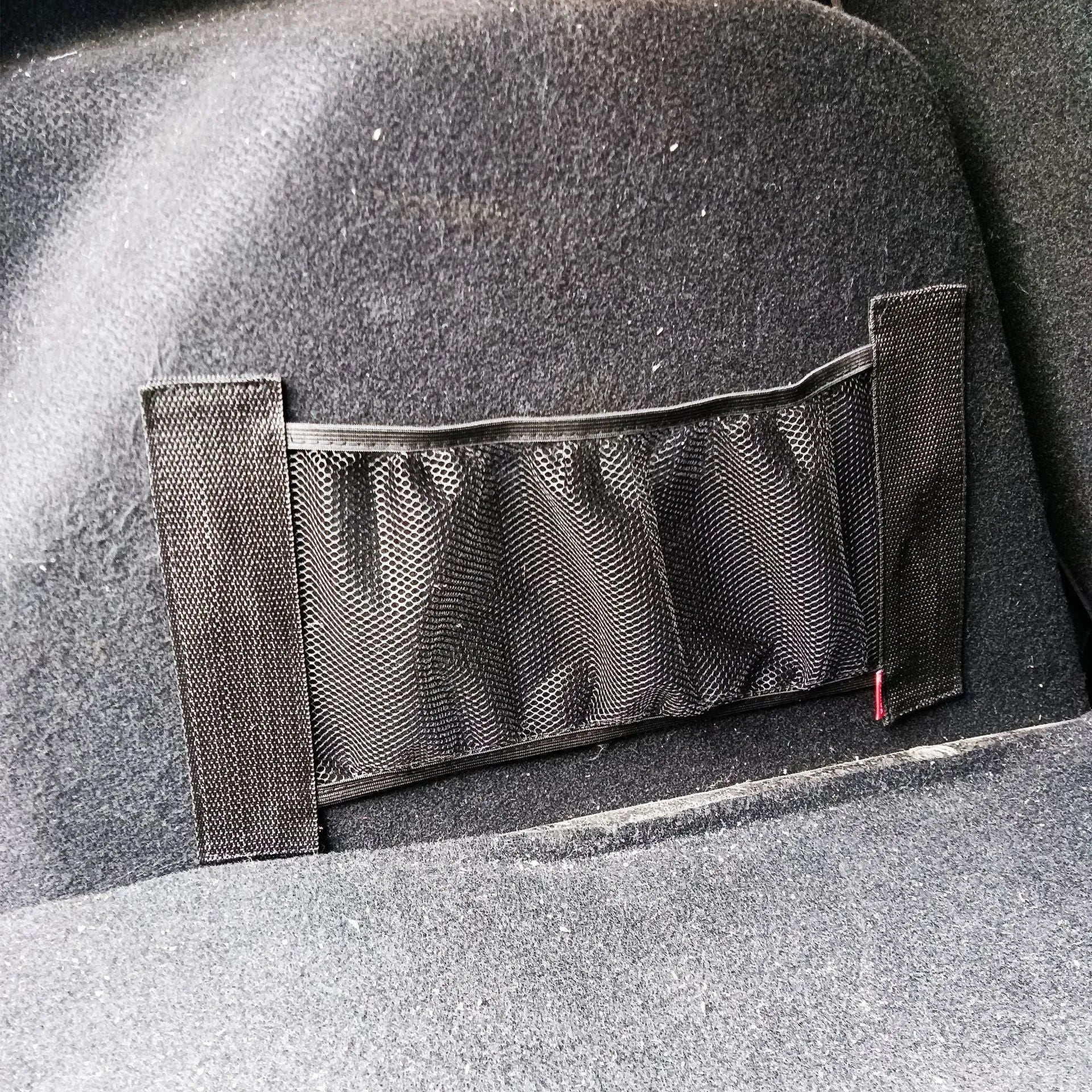 Elastic polyester mesh storage net for car boot organisation in 20x35cm and 20x45cm sizes.