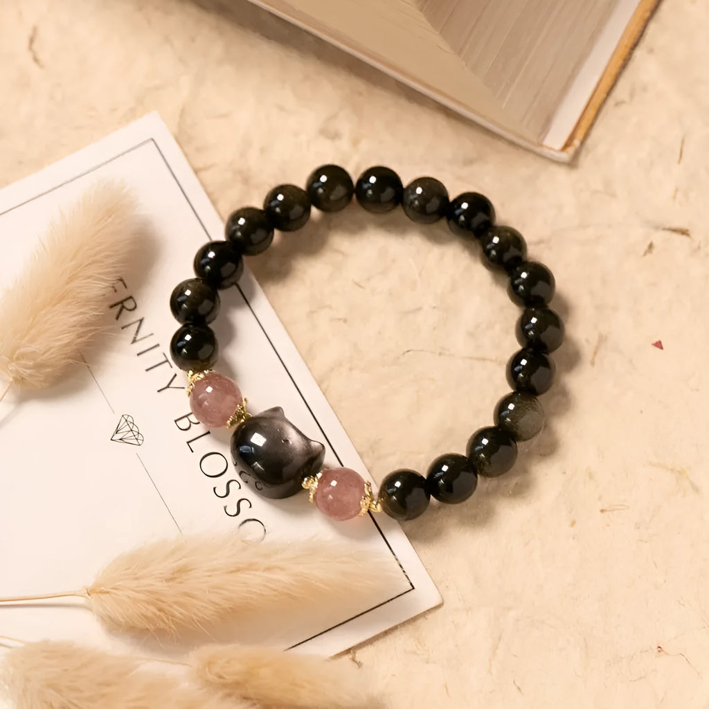 Natural obsidian bracelet with 8mm black beads and kitty charm on adjustable string