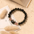 Natural obsidian bracelet with 8mm black beads and kitty charm on adjustable string