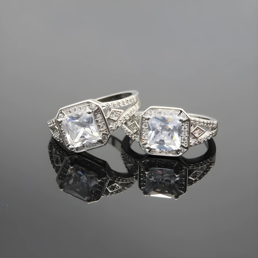 Women's geometric hollow zircon ring in platinum colour showing quadrilateral design and inlaid stones