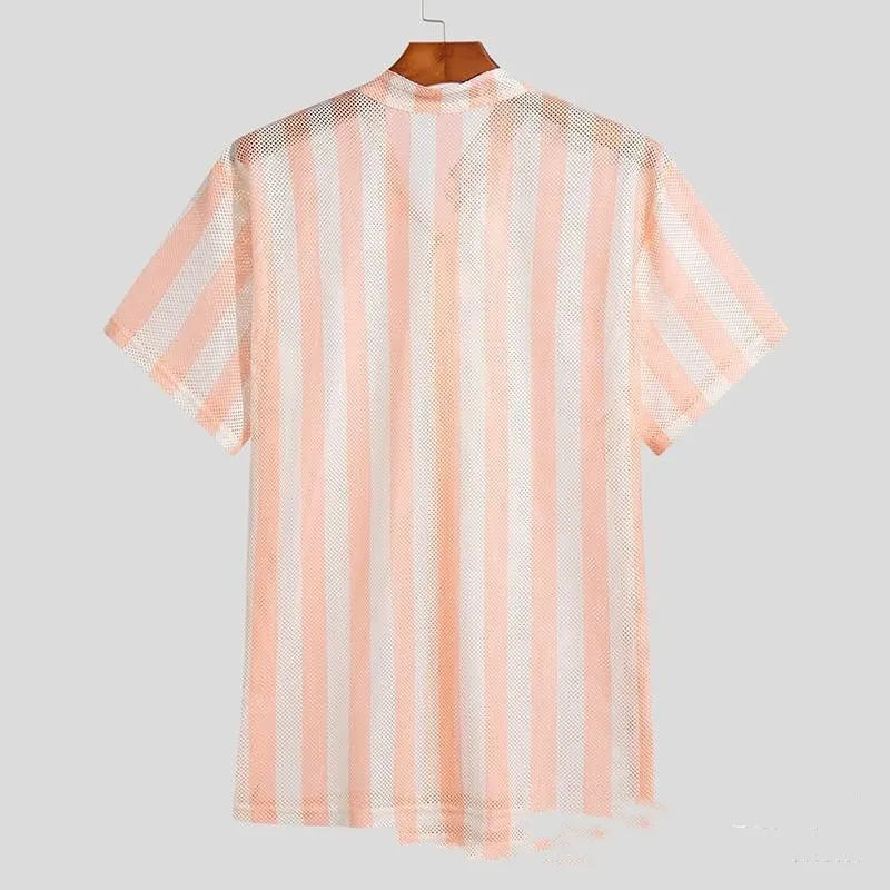 Pink men's loose-fit cardigan shirt with short sleeves and a waffle-textured fabric.