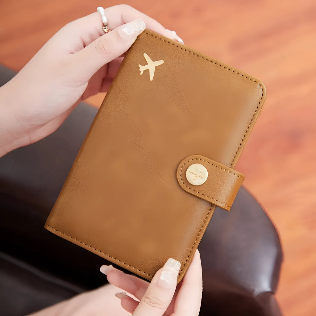 PU leather passport holder with RFID protection in multiple colour options including pink, black, and blue