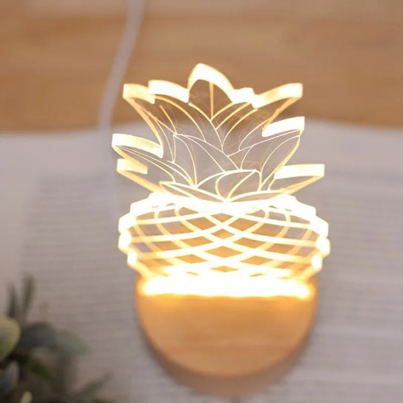 Wooden and acrylic pineapple-shaped USB table lamp with dimmer switch on a bedside table.