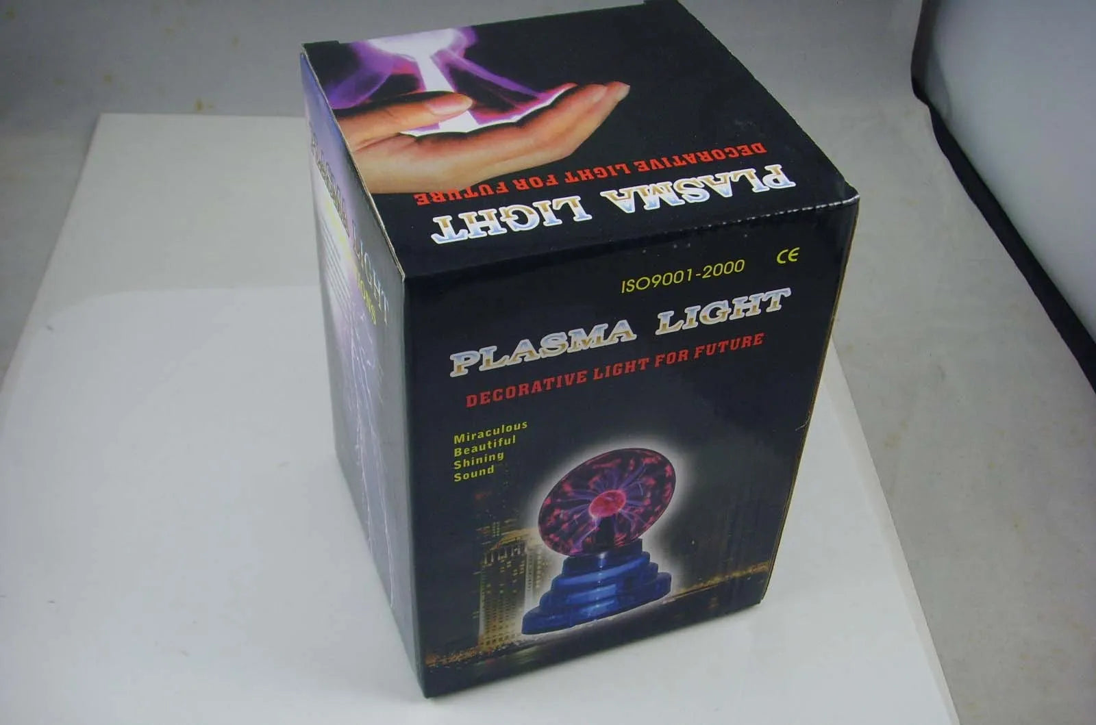 Colourful anti-radiation magic ball light with glass sphere on ABS base and USB cable.