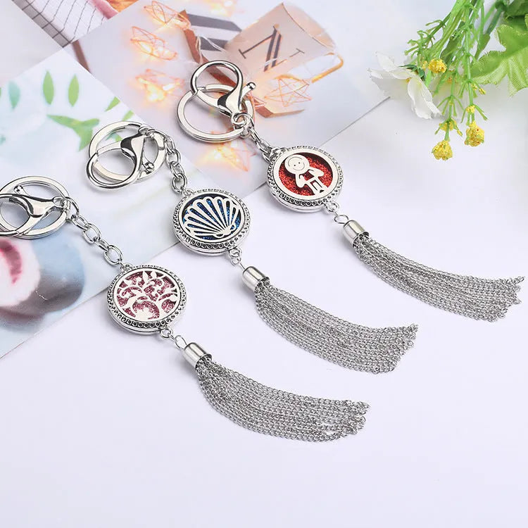 Alloy tassel car pendant air freshener hanging from a rear-view mirror on a 50cm chain