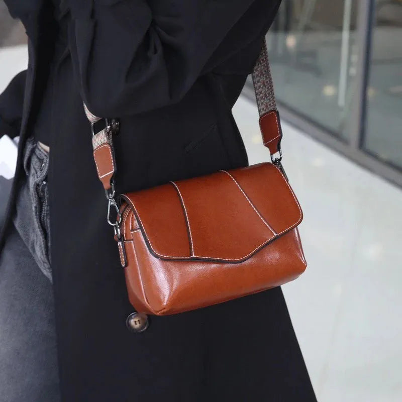 Top grain leather crossbody bag for women in caramel colour with zip closure and patchwork design