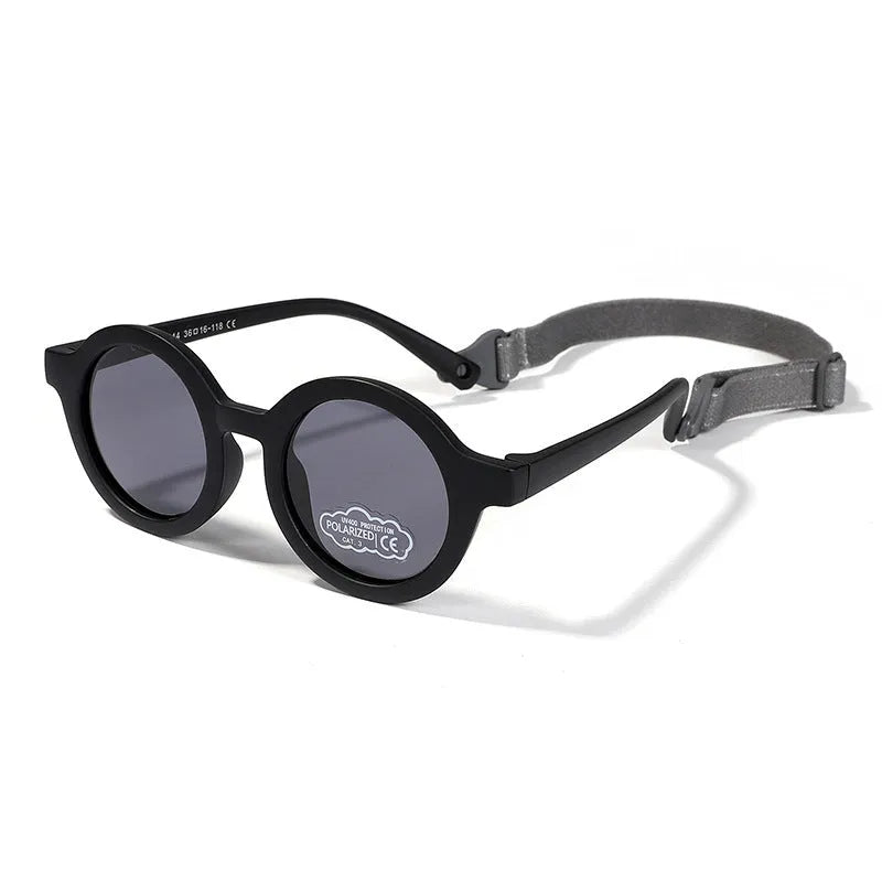 Children's silicone sunglasses with round frames and polarised lenses for 0-3 year old UV protection