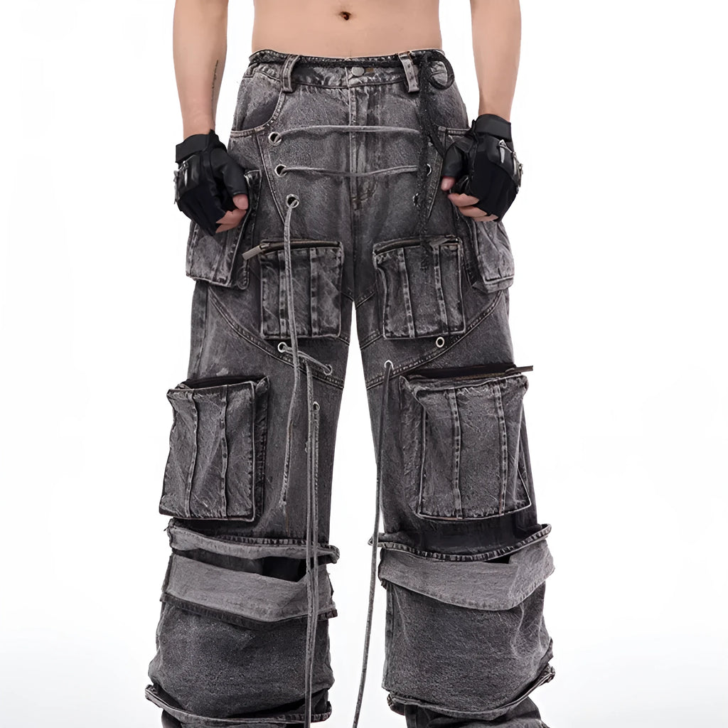Grey denim distressed overalls with rope stitching and a wide-leg mop pants silhouette.
