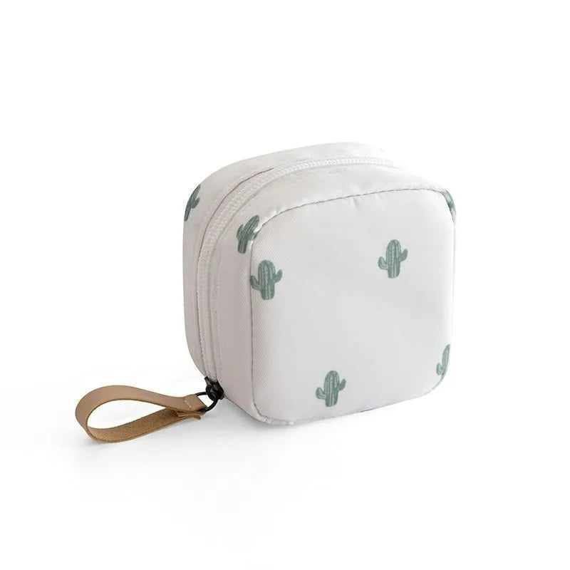 Cloth cube-shaped makeup storage bag in blue, pink, white, and white pink colour options.