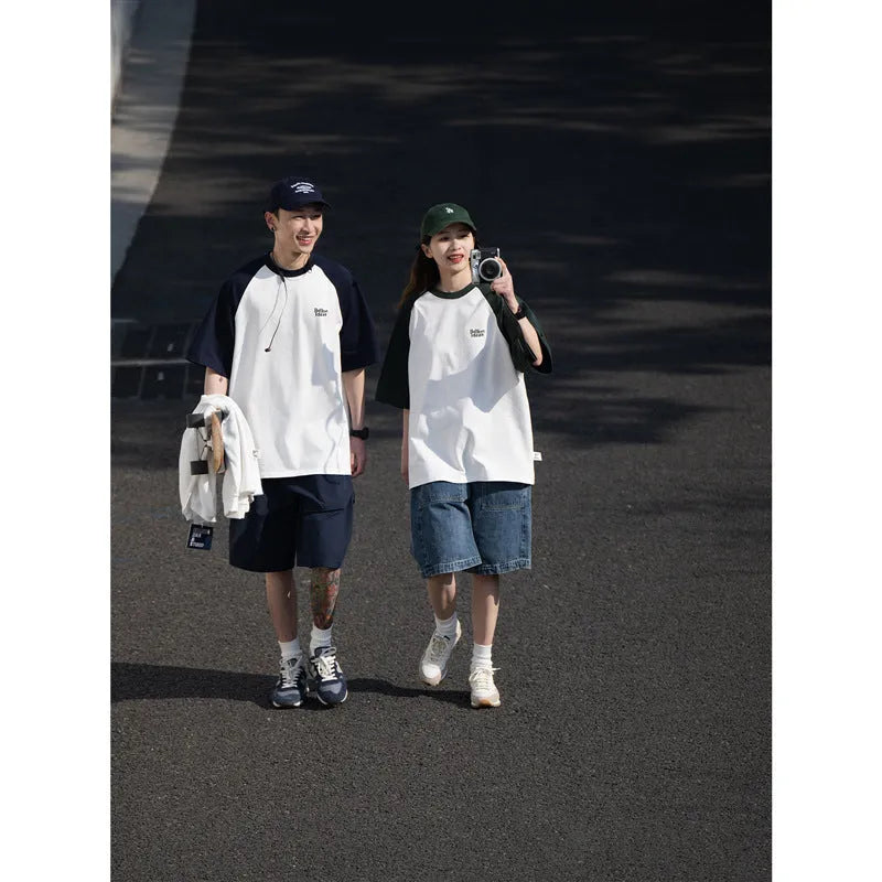 Men's blue Japanese junior style raglan sleeve t-shirt with loose fit on hanger