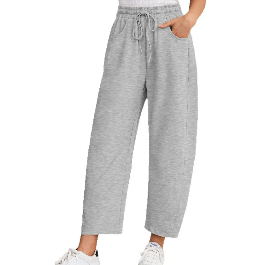 Loose cropped cotton sweatpants with elastic waist and pockets in multiple colour options