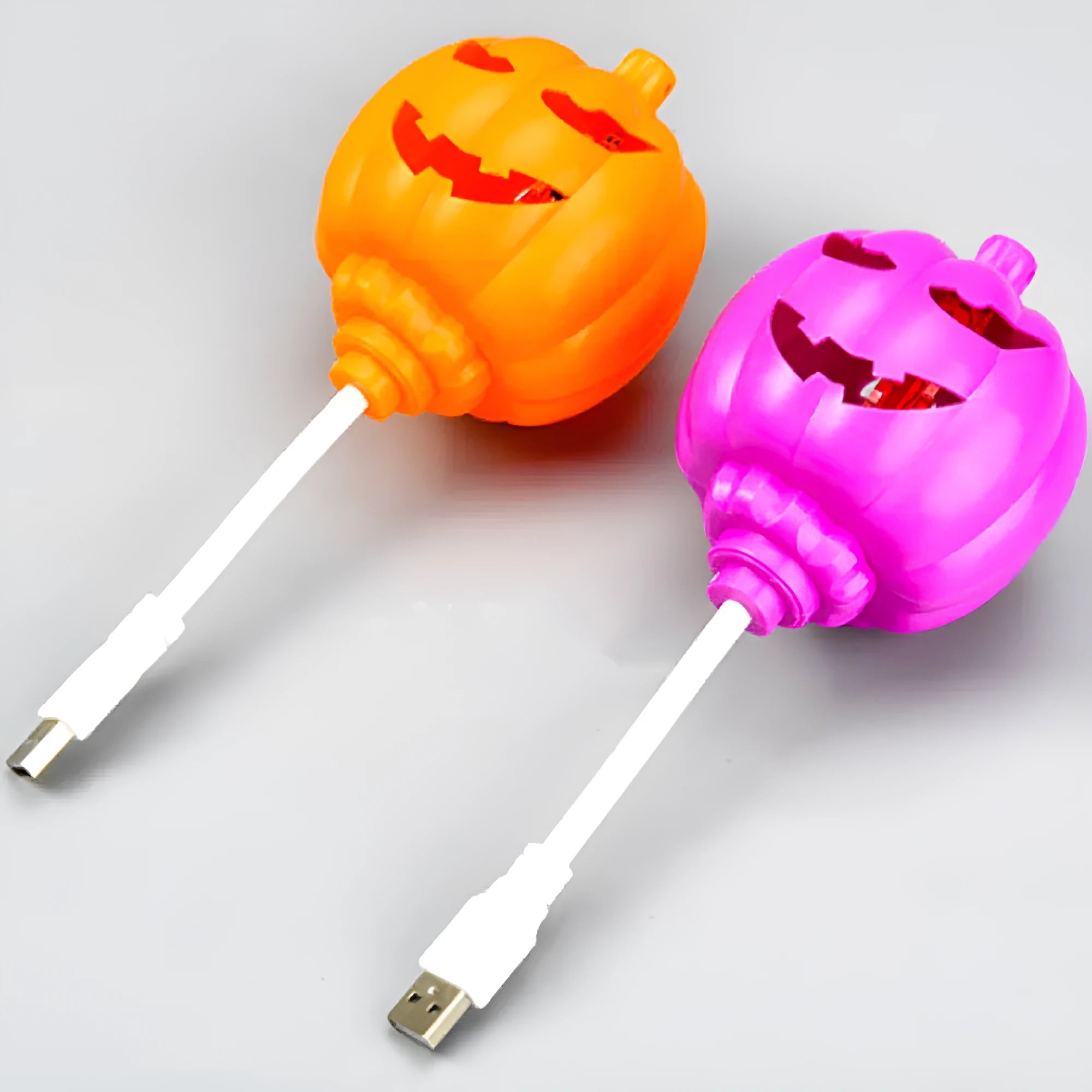 Plastic pumpkin-shaped decorative lamp with USB charging port, shown with purple or yellow light option.