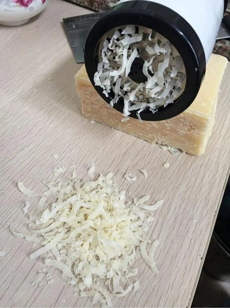 Stainless steel rotary cheese grater with black and white finish, height 17cm, diameter 7.3cm, with two blades