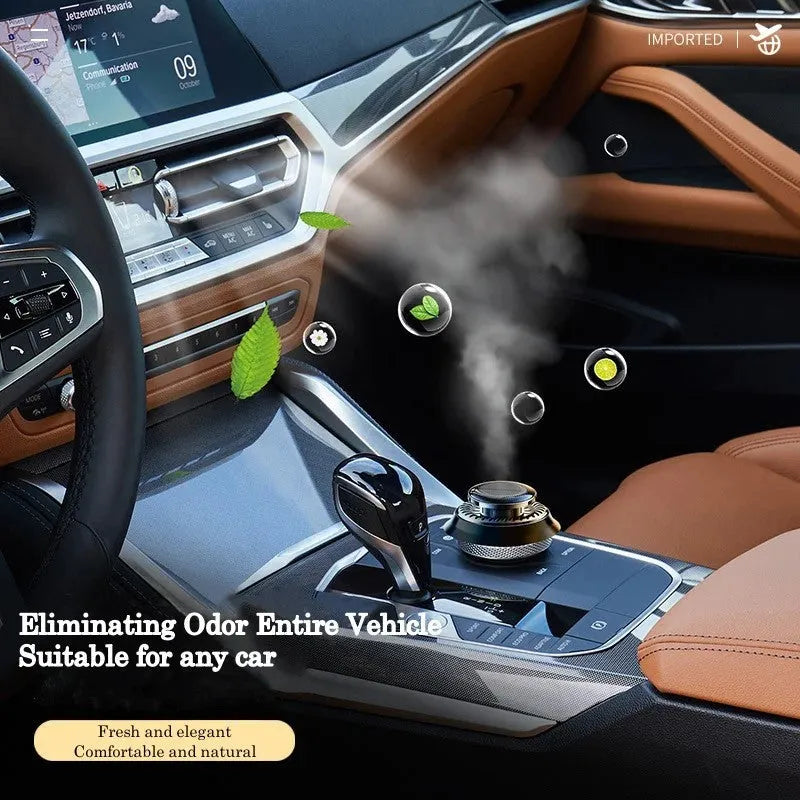 Solar-powered kinetic car air freshener with double-ring rotating mechanism in black plastic housing