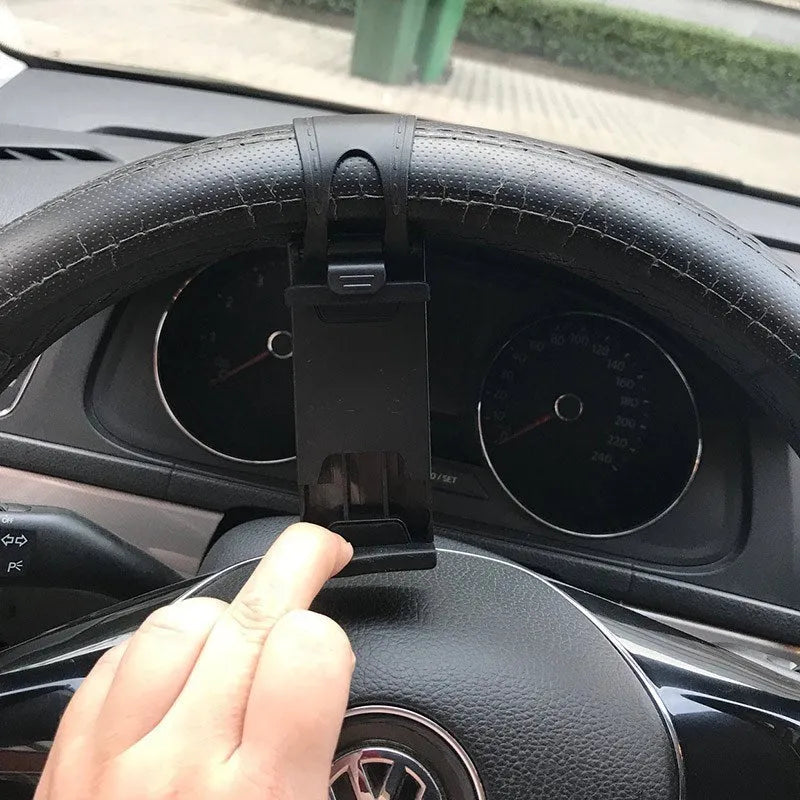 Black steering wheel phone holder with silicone pad for smartphone protection measuring 75x40x25mm