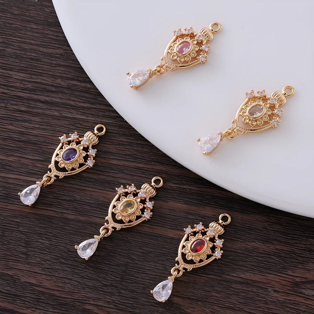 Water drop pendant with micro-inlaid zircon detailing on hollow crown setting in five colours