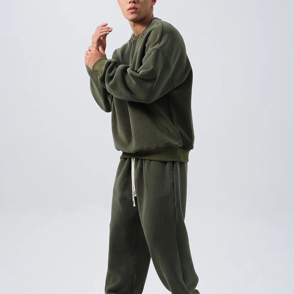 Men's polar fleece winter sports suit with long sleeve top and trousers in multiple colours.