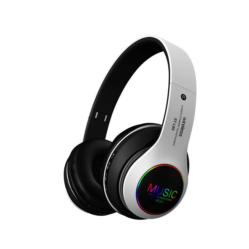 Black Bluetooth over-ear headset with microphone, showing USB charging port and 3.5mm jack