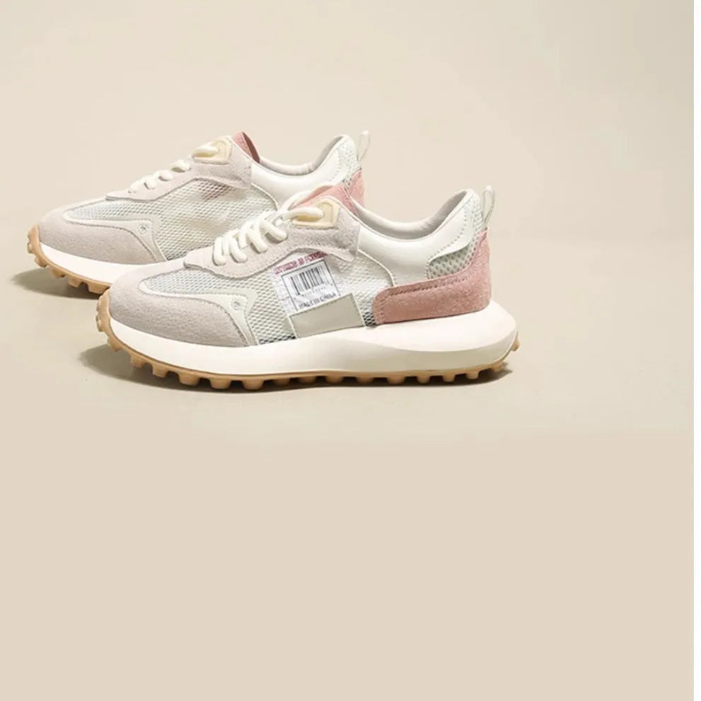 Women's grey and pink retro sneakers with low-top design and rubber sole