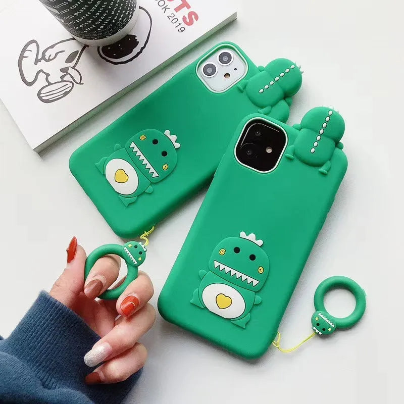 Green silicone iPhone case with a cartoon animal design on the back.