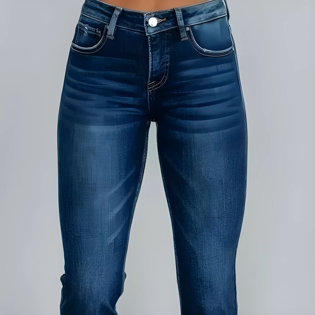Casual women's denim trousers with hand-worn detailing in dark blue cotton fabric